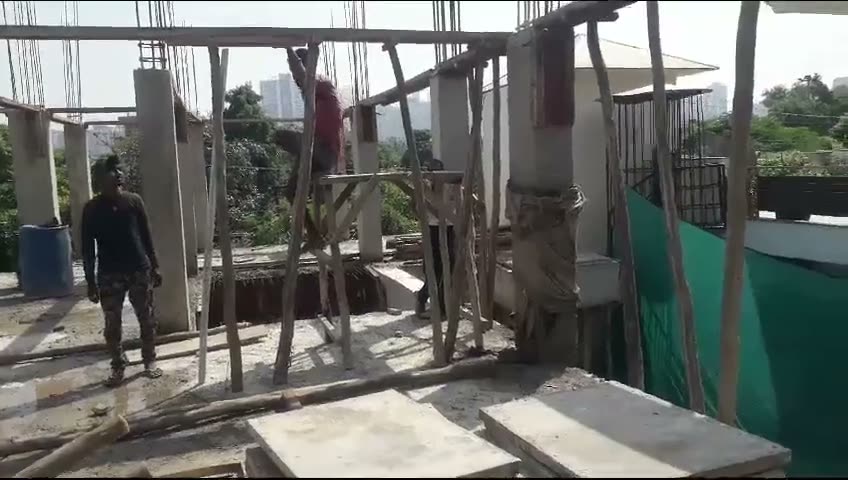 Column and slab work on a building in Noida